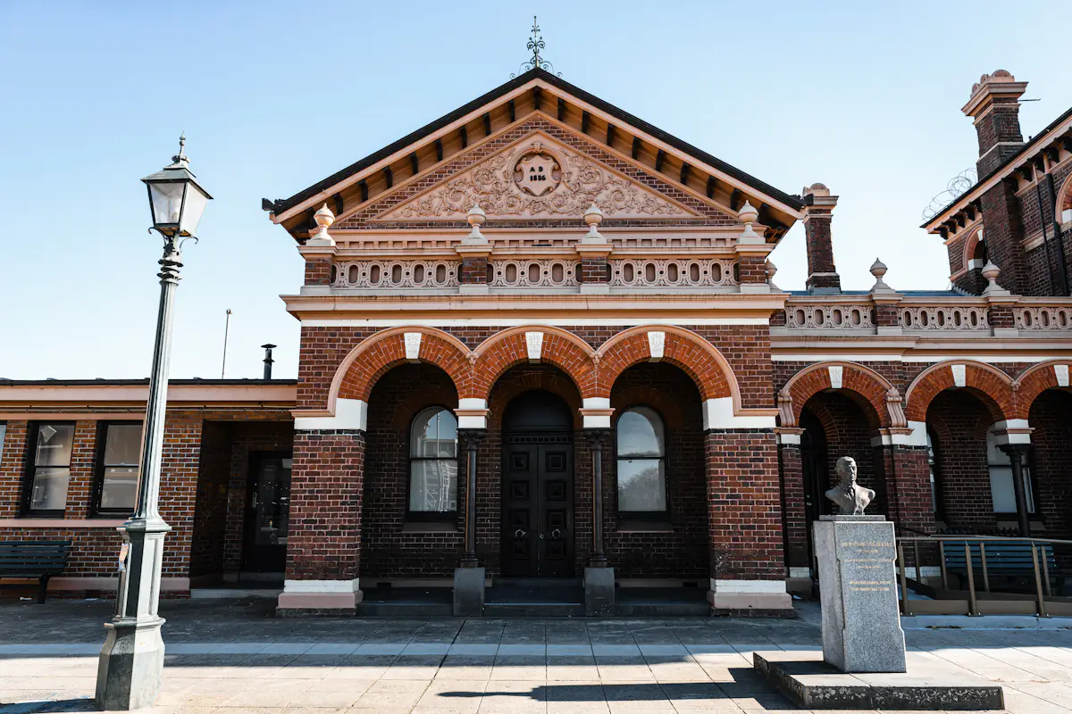 A heritage courthouse building with a clock tower